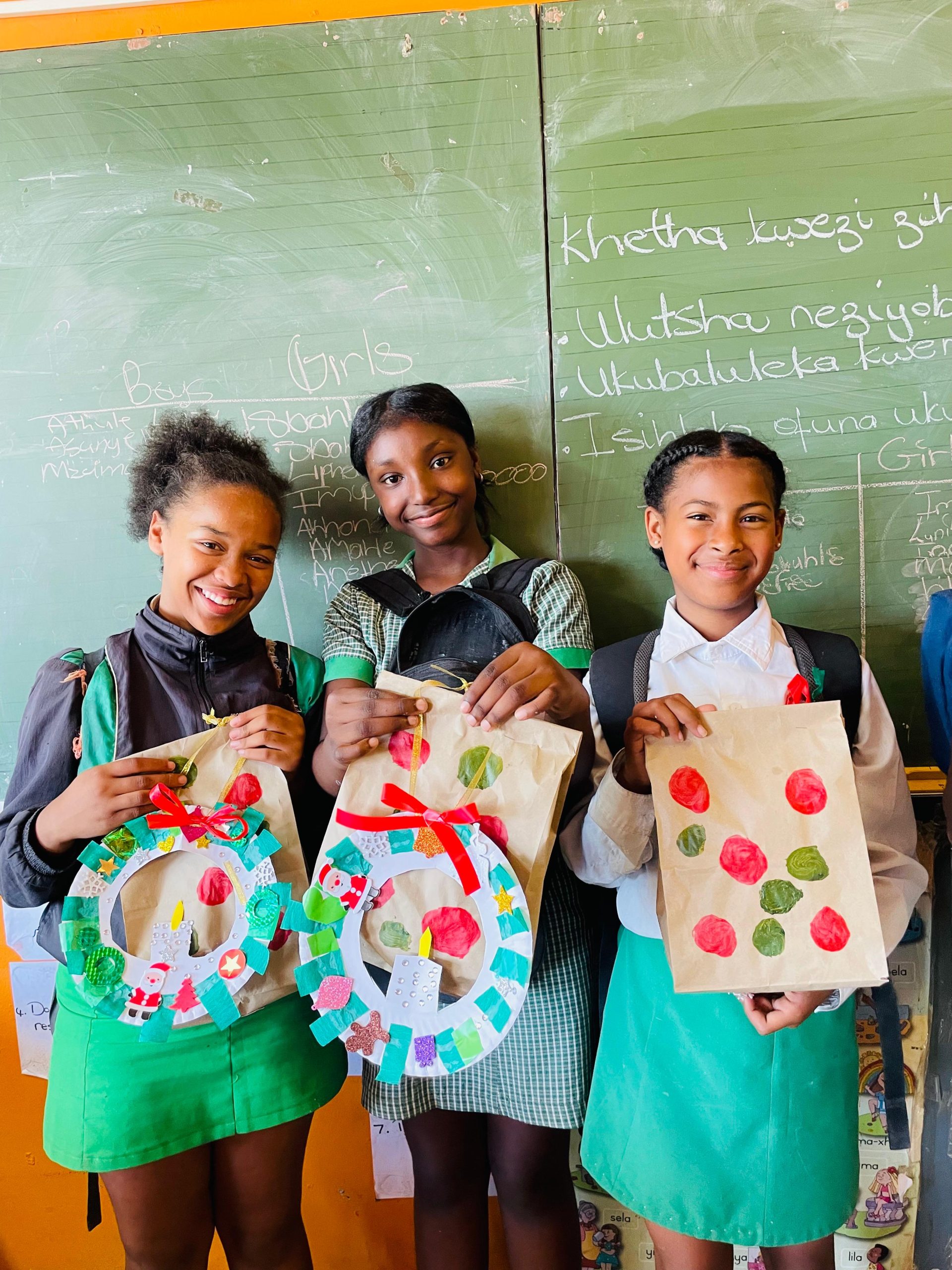 Girls showing drawings